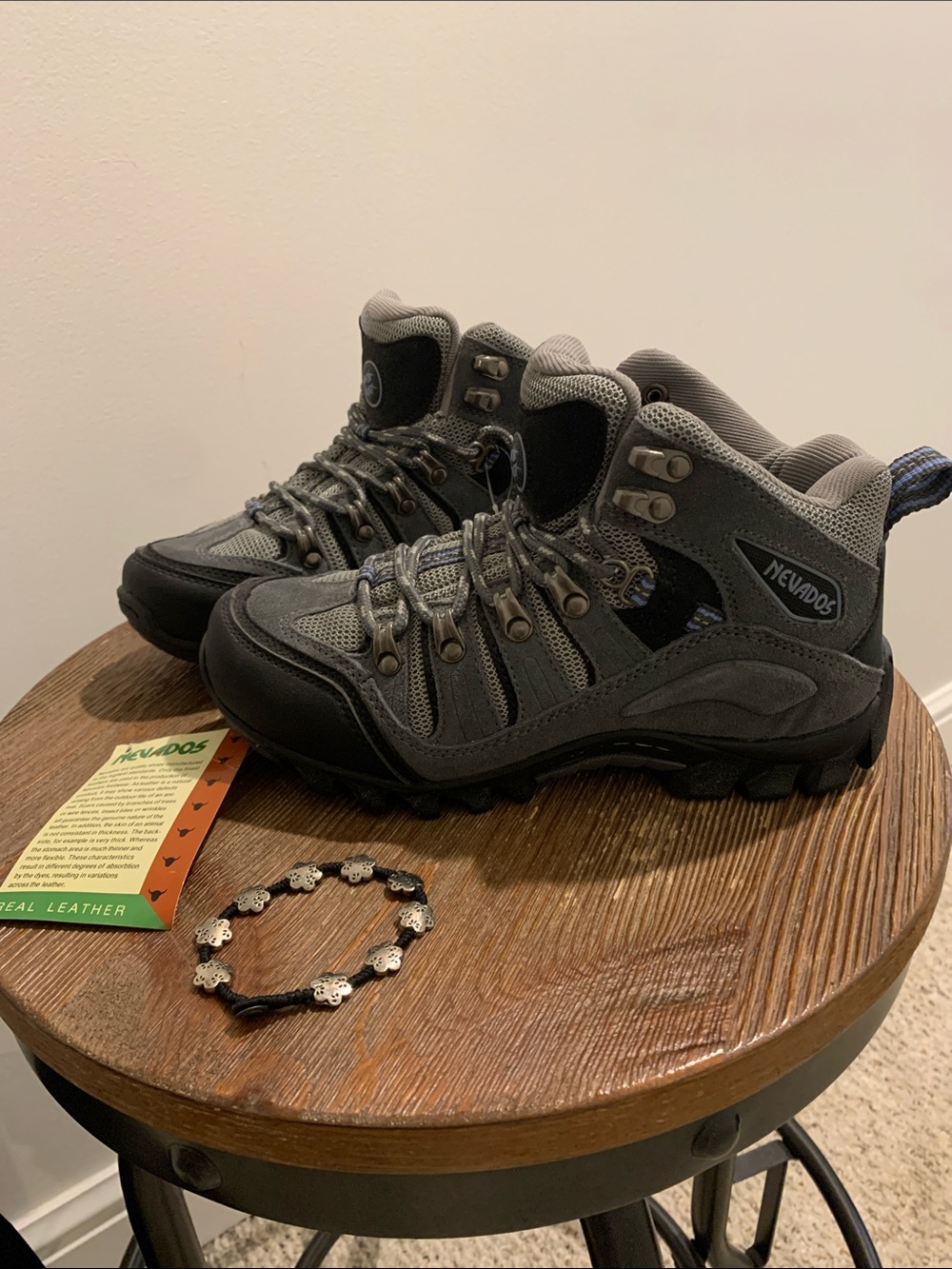 NevadOS Women's Gray Lace-Up Hiking Boots with bracelet.